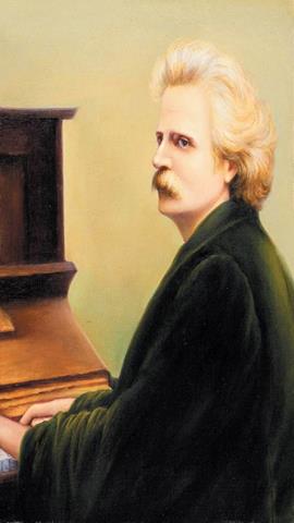 图片格里格在弹钢琴